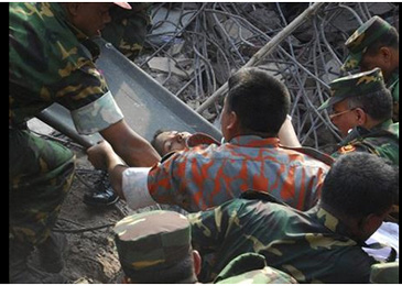 Miraculous as it may sound, a woman was rescued alive, almost unhurt, from inside the rubble of Rana Plaza Friday afternoon, the 17th day into the country